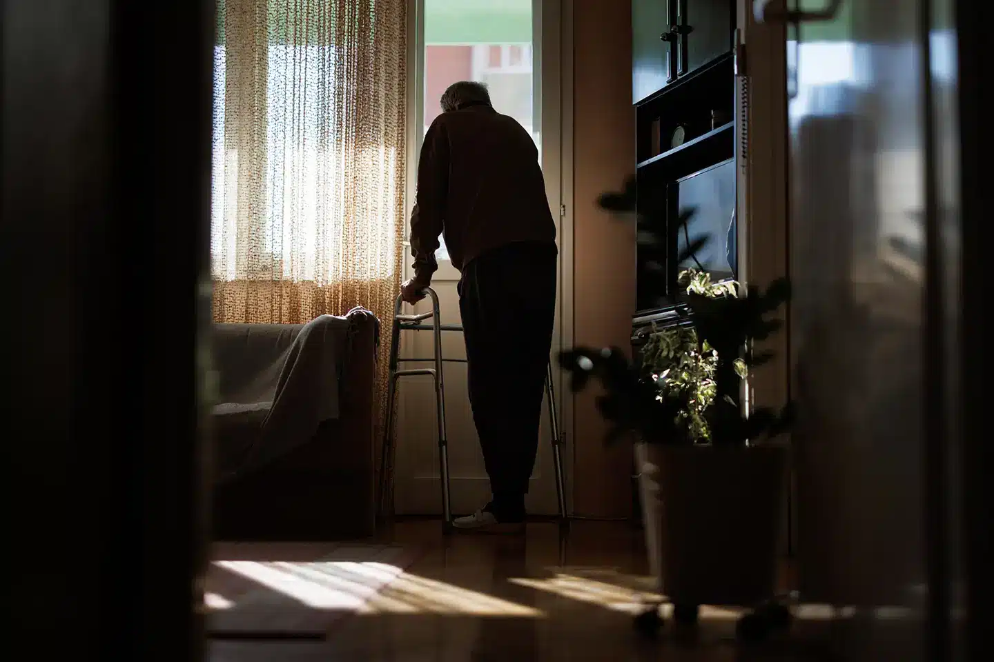 Older adult using home walker